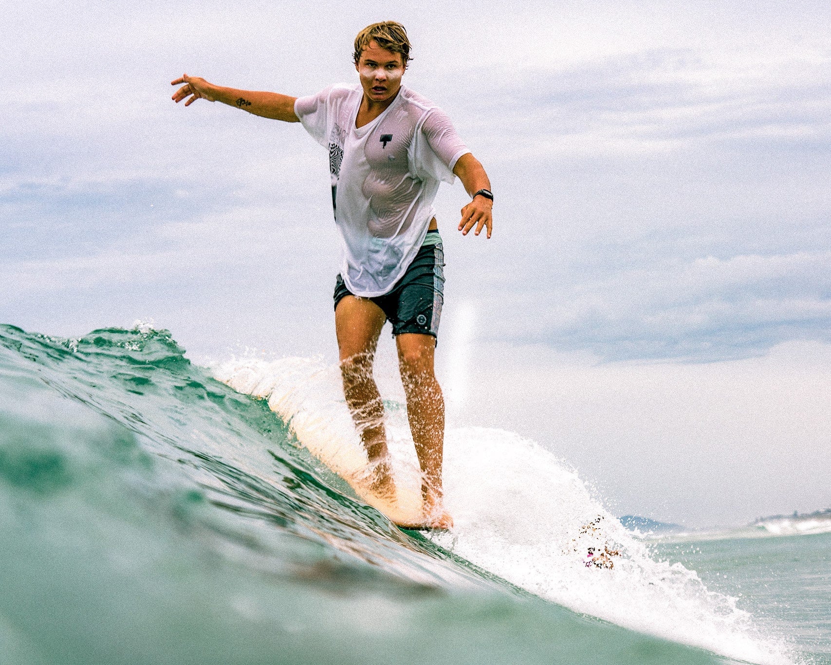 surfer on longboard